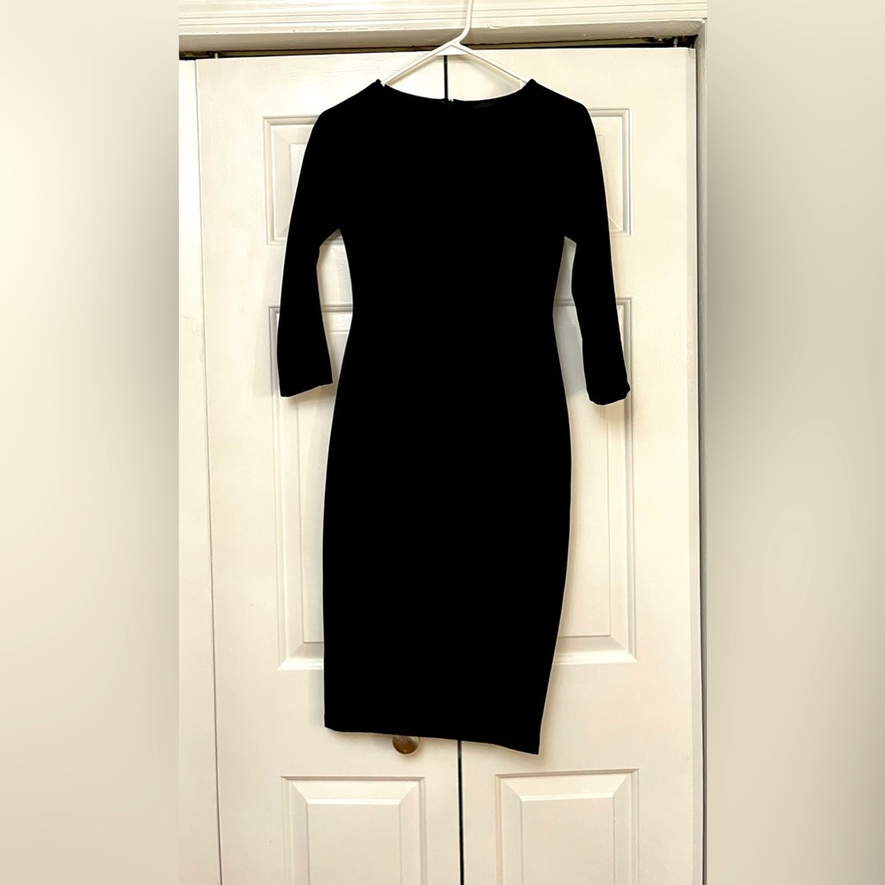 Zara black dress to the knee. Size small. Form fitting.